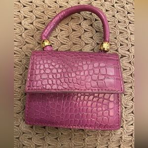 Mini purple crocodile embossed clutch/bag.